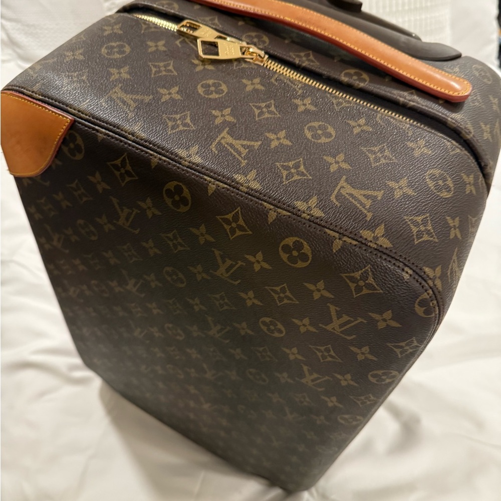 Brown monogram carry on